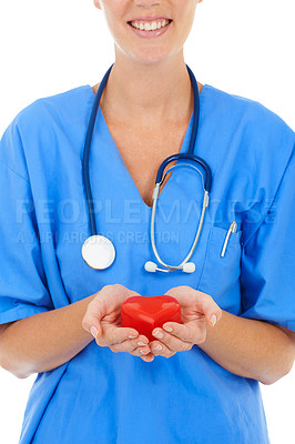 Buy stock photo Closeup of a surgeon holding a heart in her hands