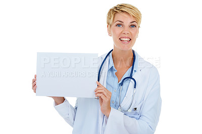 Buy stock photo Doctor, woman and smile in portrait, poster for advertising and healthcare information with board on white background. Medical professional with announcement, paper or mockup space for ads in studio