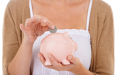 Buy stock photo Woman, hands and coin in piggy bank for savings, investment or financial growth on a white studio background. Closeup of female person with money container for finance, budget or safe cash and profit