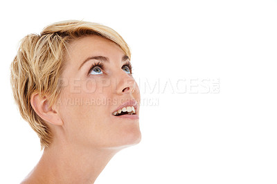 Buy stock photo Woman, face and looking up on mockup space for news, notification or alert on a white studio background. Closeup of young female person, model or blonde smile in wonder, thinking or sight for vision
