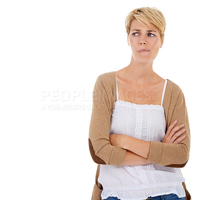 Buy stock photo Woman, thinking and arms crossed in doubt, choice or decision on a white studio background. Young female person, model or blonde looking in distance, wonder or thought for ideas on mockup space