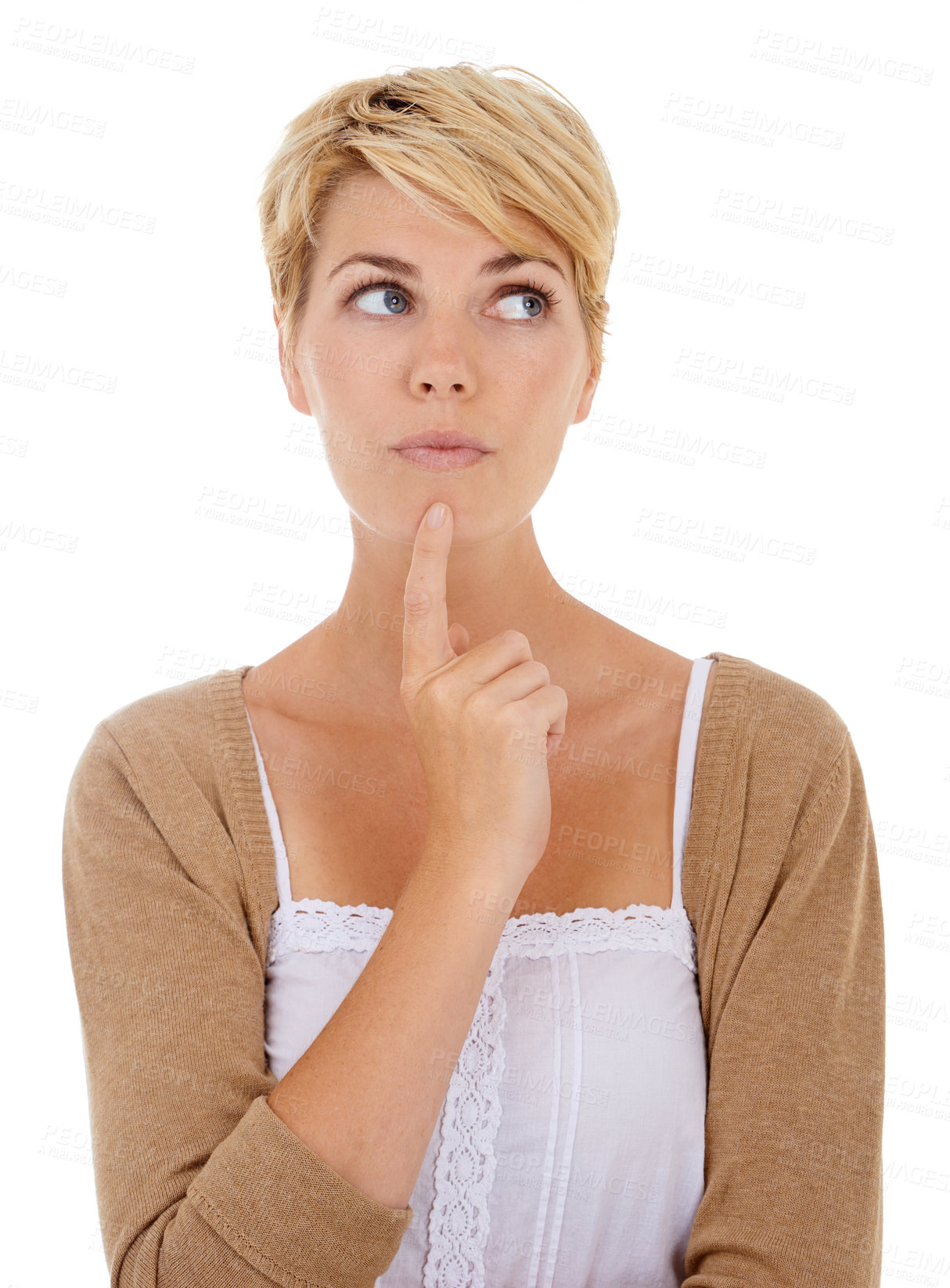 Buy stock photo Studio shot of an attractive woman looking thoughtful against a white background
