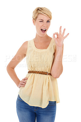 Buy stock photo Happy woman, portrait and wink with okay sign for good job or perfect gesture on a white studio background. Female person, model or blonde smile with like emoji, yes or ok for approval or spot on