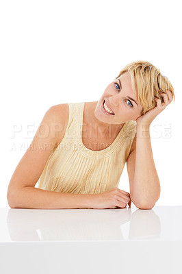 Buy stock photo Happy woman, portrait and relax in casual fashion on table isolated on a white studio background. Face of young female person, model or blonde smile in confidence or style for beauty on mockup space
