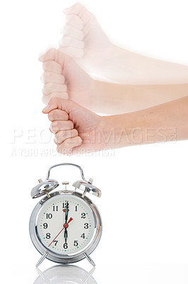 Buy stock photo Person, hand and hitting alarm clock for alert, wakeup or deadline on a white studio background. Closeup of fist slamming down on time for stop in motion blur, schedule or management for planning
