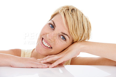 Buy stock photo Happy woman, portrait and face in relax on table isolated on a white studio background. Closeup of young female person, model or blonde smile in confidence with hairstyle for beauty on mockup space