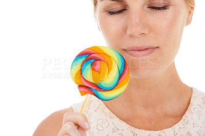 Buy stock photo Woman, lollipop and studio or candy sweets snack on white background for treat, dessert or party food. Female person, eyes closed and model for fun cane taste or happy, colorful swirl or unhealthy