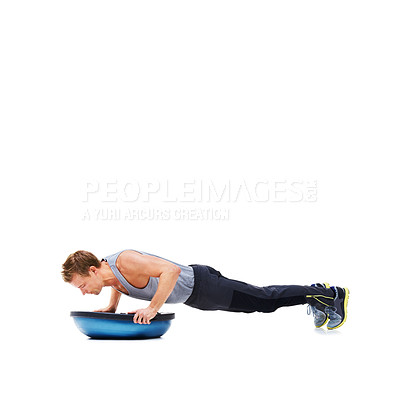 Buy stock photo Man, exercise and push ups with bosu ball for fitness, workout or training on a white studio background. Active male person lifting body weight for strength, muscle or strong arms on mockup space