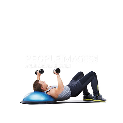 Buy stock photo Man, lying and half ball with dumbbells for workout, exercise or weightlifting on a white studio background. Active young male person with weights in core training, gym or fitness on mockup space