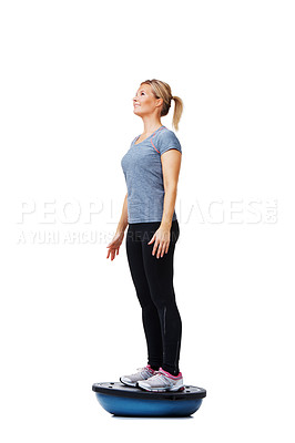 Buy stock photo Woman, balance ball and standing for training, exercise or workout on white studio background. Active female person or athlete on half round object for fitness, health and wellness mockup space