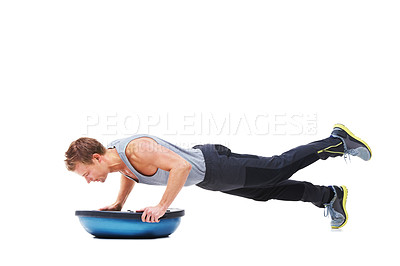 Buy stock photo Man, half ball and exercise in studio for strong core, workout and fitness challenge for wellness. Male person, athlete and equipment for training, mockup space and performance by white background
