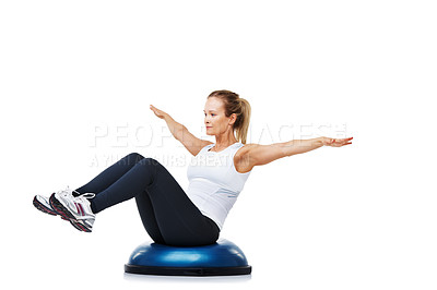 Buy stock photo Fitness, half ball and young woman in a studio for stretching body workout or training with balance. Sports, equipment and female person with muscle warm up exercise isolated by white background.