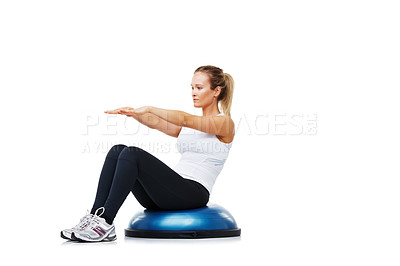 Buy stock photo Health, half ball and young woman in a studio for stretching body workout or training with balance. Sports, equipment and young female person with muscle warm up exercise isolated by white background