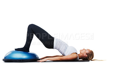 Buy stock photo Woman, half ball and bridge exercise for pilates practice, studio workout or core strength development. Balance challenge, fitness and sports athlete doing abs training on white background floor