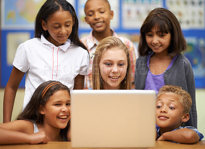 Buy stock photo Children, students and computer in classroom for education, learning and video streaming with group project. Happy diversity kids and girl with leadership on laptop at school for online information