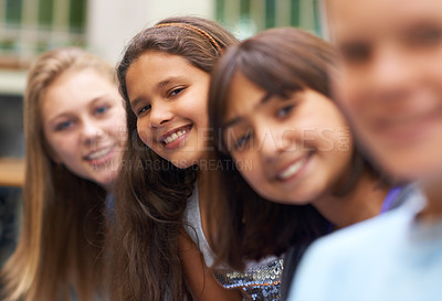 Buy stock photo Girl, portrait and happy outdoor at school with confidence and pride for learning, education or knowledge. Student, person or face with smile in building or hallway before class or ready to study
