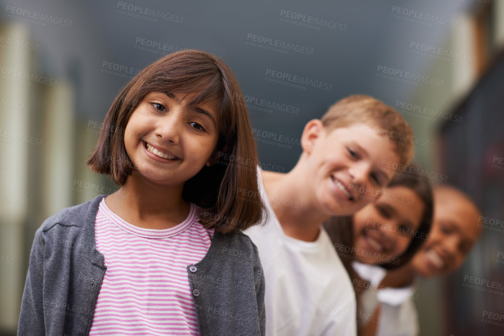 Buy stock photo Girl, portrait and friends in row at school with confidence and pride for learning, education or knowledge. Student, people and face with smile in building or hallway before class or ready to study