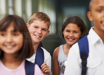 Buy stock photo Boy, portrait and friends in corridor or happy with backpack or pride for learning, education or knowledge. Student, people and face with smile in building or hallway before class or ready to study  