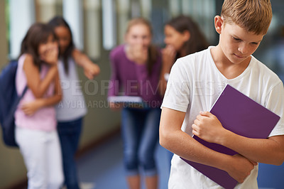 Buy stock photo A young boy being bullied at school