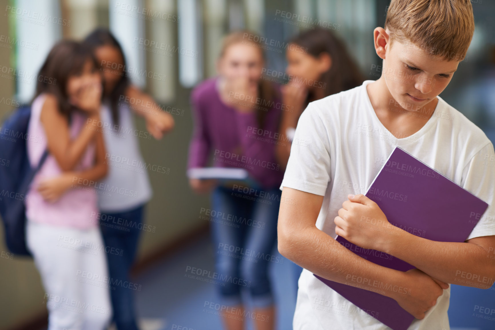 Buy stock photo A young boy being bullied at school