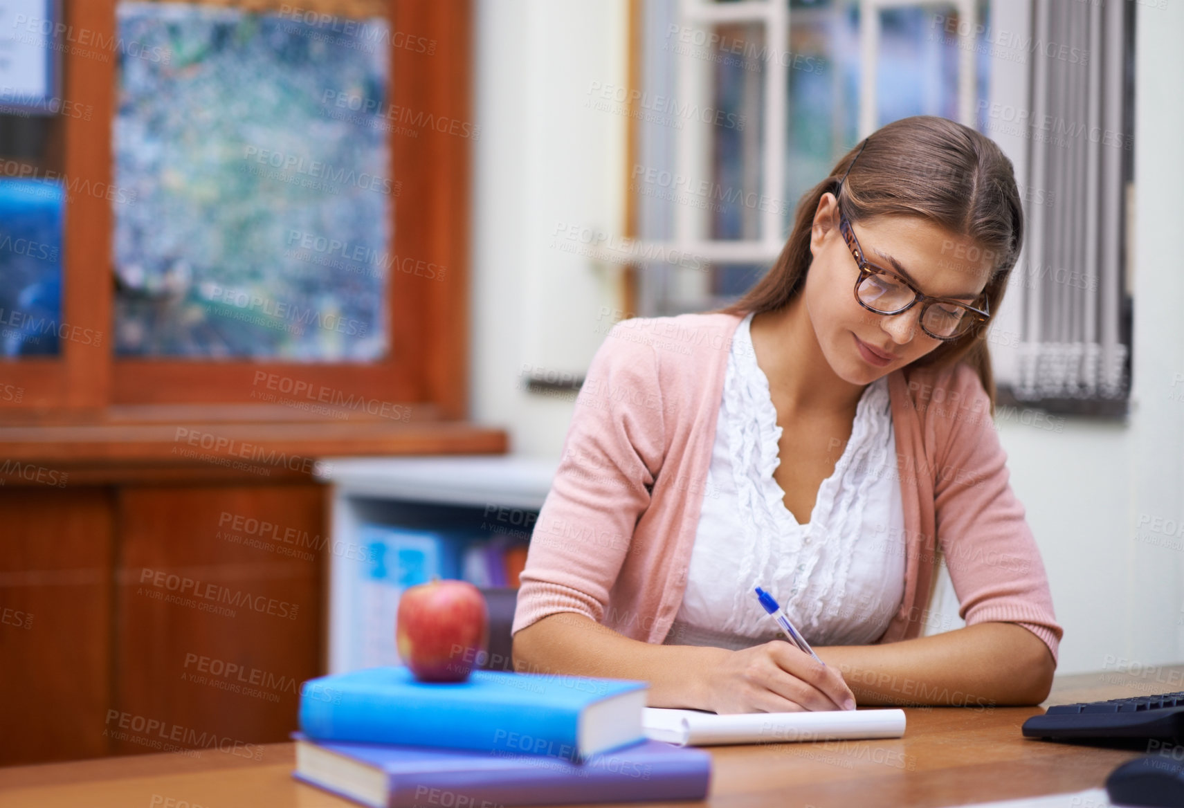 Buy stock photo School teacher, woman writing and planning in classroom, brainstorming and ideas for education. Female person, knowledge and information for learning, contemplating academic and notepad for notes