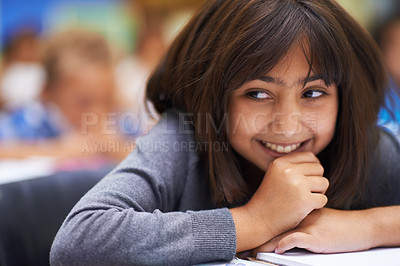 Buy stock photo Girl, education and happy in classroom for knowledge, information and notes for learning in school. Female person, book and confidence for assessment or test, studying lesson and smiling at academy