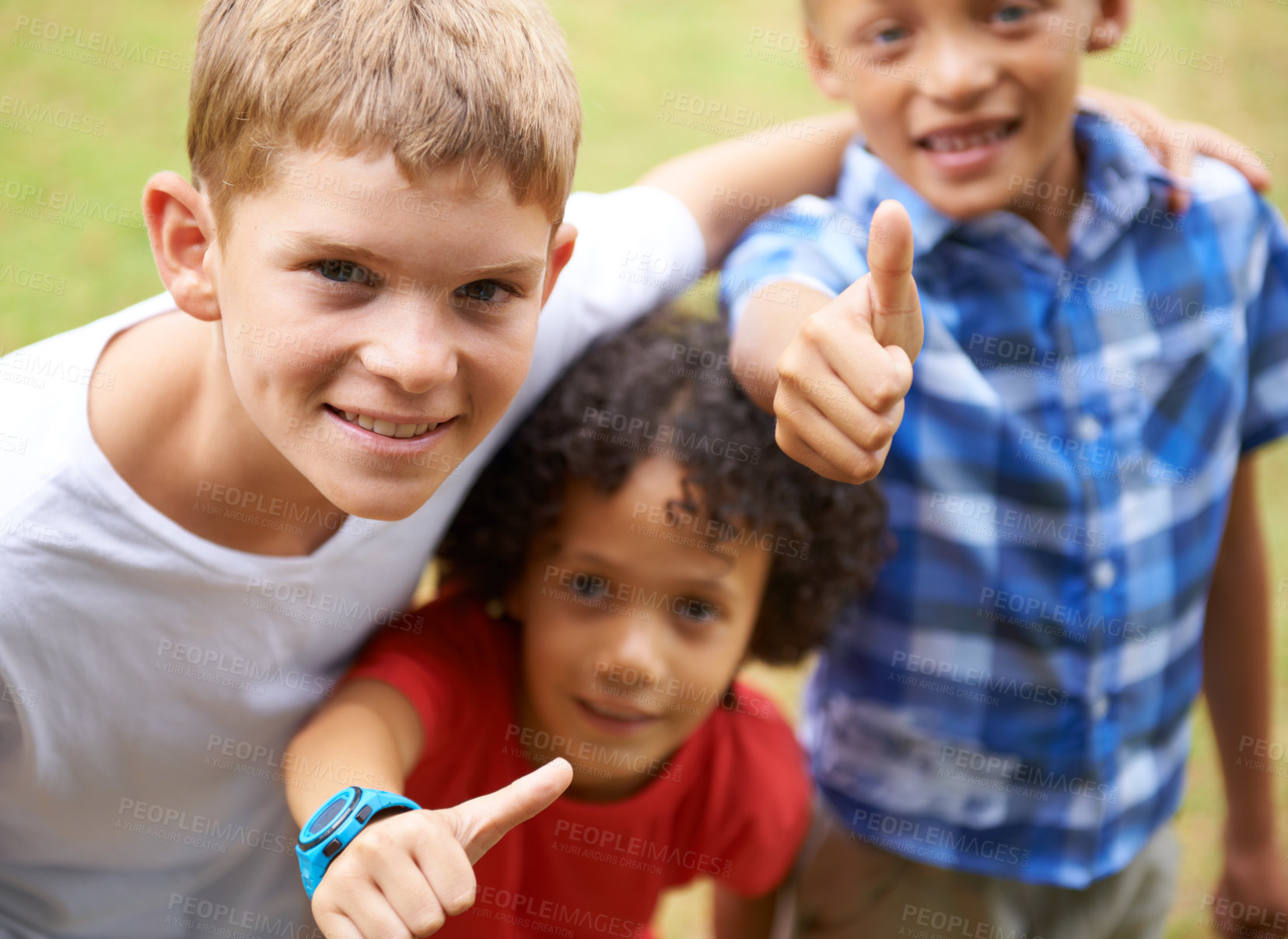 Buy stock photo Happy children, portrait and thumbs up in nature for teamwork, winning or good job together at park. Group of casual young boys smile and hug with like emoji, yes sign or OK for outdoor success