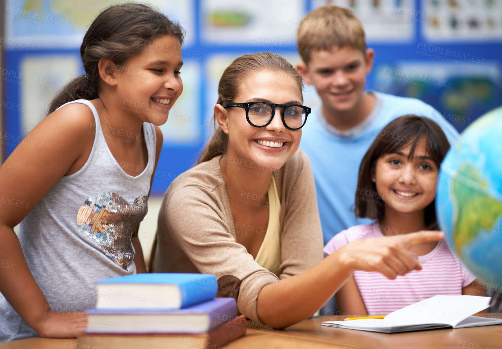 Buy stock photo Happy teacher, portrait and students with globe of planet earth in class for education or learning at school. Woman, mentor or educator smile with young kids or children with world map in classroom