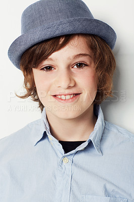 Buy stock photo Kid, boy and portrait for fashion in studio, cool clothes and confidence by white background. Happy male person, child and cool hat by backdrop or pride for style, face and trendy outfit or relaxing