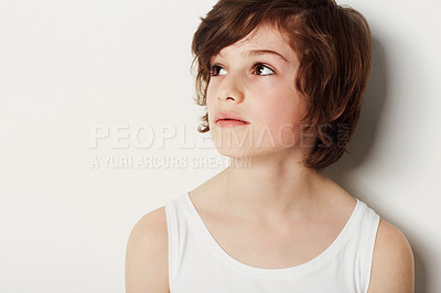 Buy stock photo Child, boy and thinking on fashion in studio, cool clothing and confidence by white background. Male person, kid and vest by backdrop or pride for style, relaxing and trendy outfit or wondering