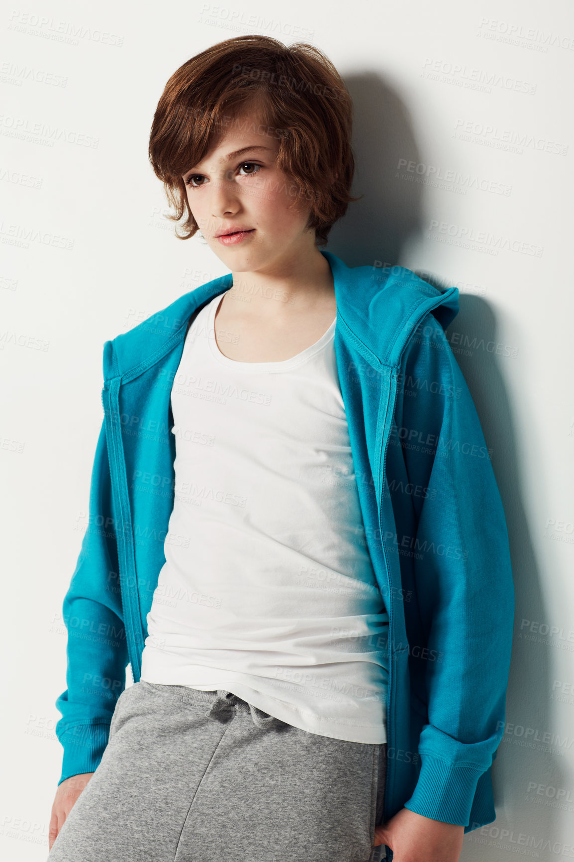Buy stock photo Cute preteen boy wearing casual attire while isolated on white