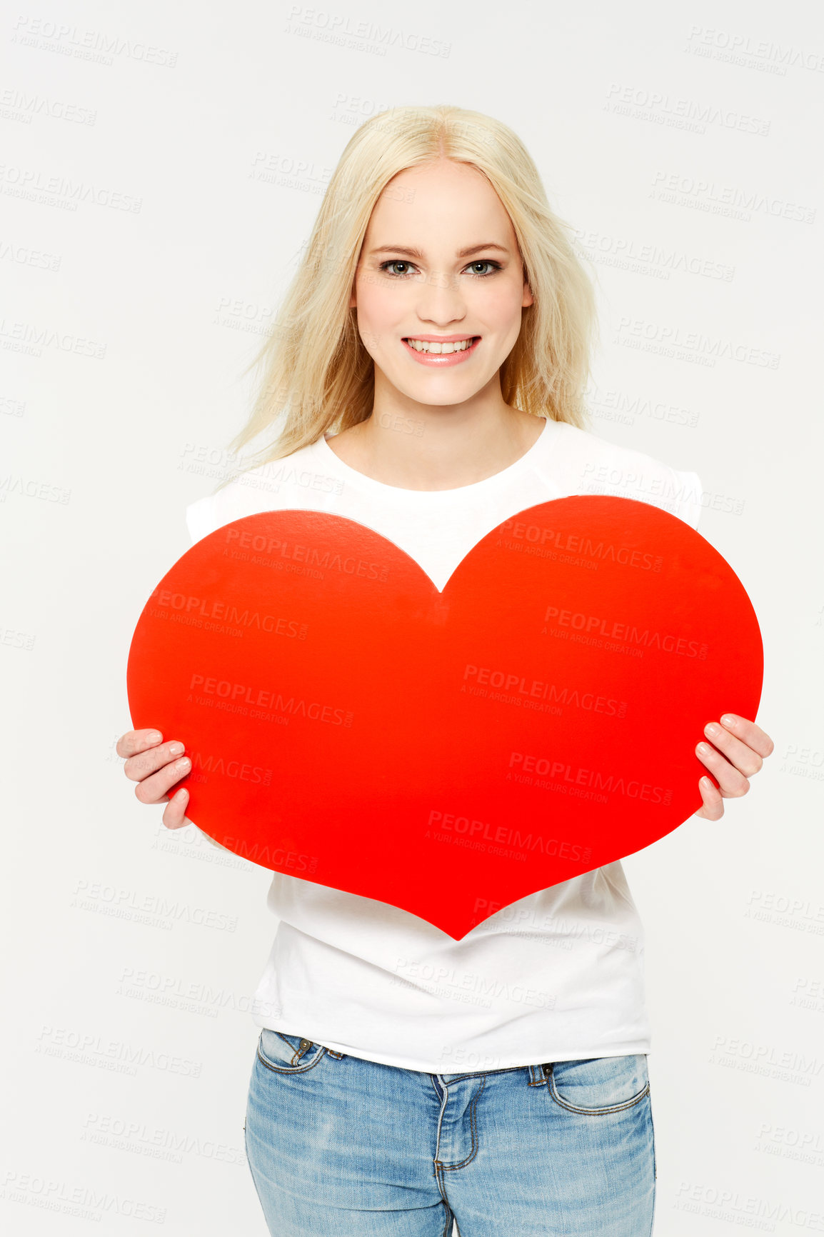 Buy stock photo Love, portrait and woman in studio with paper heart, sign and emoji against white background. Face, shape and girl showing care, affection and self love, happy and content, young and isolated space