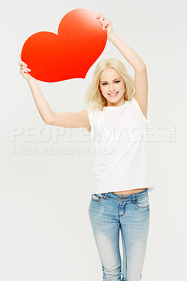 Buy stock photo Woman, studio portrait and heart board in hands with happiness, romance and white background. Model, valentines day symbol and isolated with happy, romantic or  for dating with cardboard poster sign