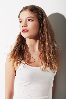 Buy stock photo Serious, beauty and young woman in studio with makeup, cosmetic and glamour face. Confident, natural and beautiful female model from Australia with hairstyle for fashion isolated by white background.