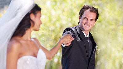 Buy stock photo Garden, happy woman and man holding hands at wedding with smile, love and commitment at outdoor reception. Romance, bride and groom at marriage celebration with nature, loyalty and future together.