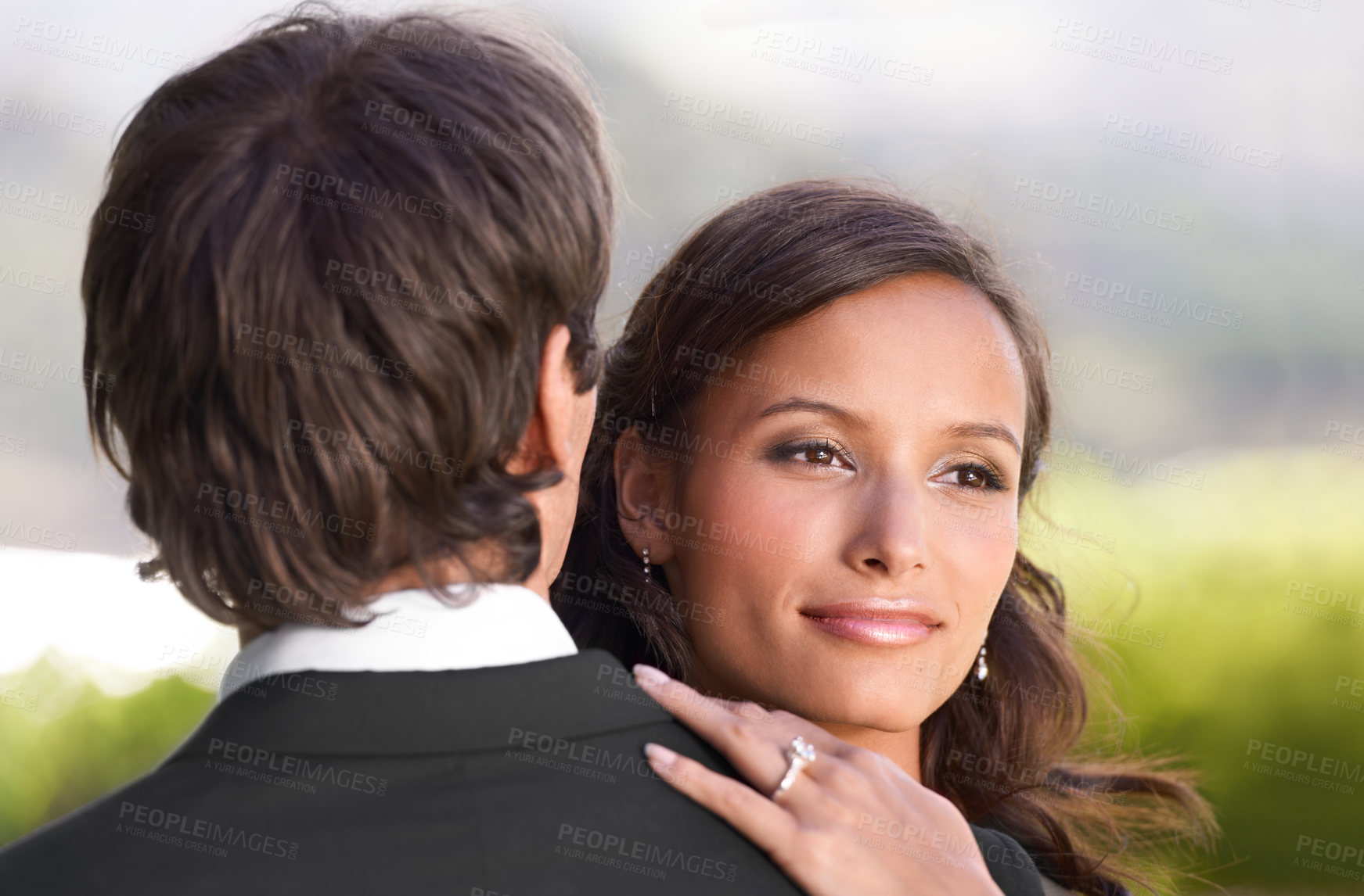 Buy stock photo Couple, dancing and embrace on wedding day for love, support and excited for marriage and commitment. People, romance and hugging at outdoor ceremony, loyalty and pride for ring and partnership