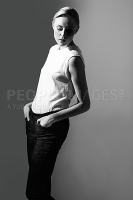 Buy stock photo Woman, black and white in studio for fashion, retro or classic aesthetic by gray background with light. Isolated model, edgy outfit or clothes with vintage style, lady or pose with art deco in studio