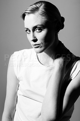 Buy stock photo Portrait, black and white in studio for model with fashion, retro or classic aesthetic by gray background. Isolated woman, face or cool clothes or shirt with vintage style, lady or pose with art 