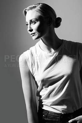 Buy stock photo Model thinking of smile, black and white for fashion, retro or classic aesthetic by gray background with light. Happy woman, edgy or trendy clothes with vintage style, fancy lady or pose in studio