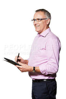 Buy stock photo Studio portrait of a mature man working on a digital tablet
