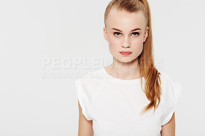 Buy stock photo Serious, teenager and portrait with fashion in studio and white background with confidence and pride. Beauty, face and girl with a ponytail in casual trendy style with makeup in mock up space 