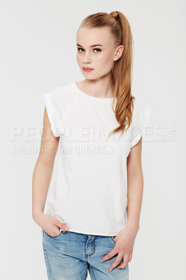 Buy stock photo Studio portrait of a beautiful read head standing with her hand in her pocket