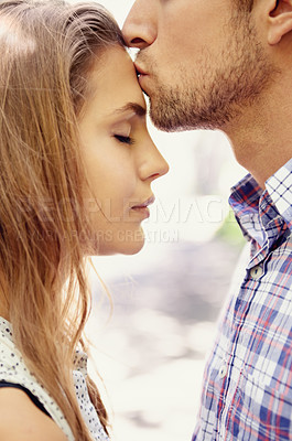 Buy stock photo Love, couple and forehead kiss, park and happiness for relationship, dating and quality time outdoor. Romance, man and woman with affection, loving or bonding with romantic gesture or kissing on head