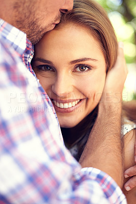 Buy stock photo Happy couple, hug woman and portrait in park closeup on valentines date, love and romance with smile. Man, kiss and outdoor embrace for dating, romantic adventure and bonding with care in sunshine