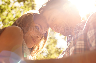 Buy stock photo Lens flare, couple or forehead touch on love date, valentines day or bonding hug in nature park, relax garden or low angle. Smile, happy man or embrace woman in trust, security or partnership support