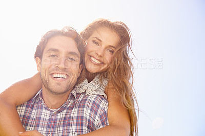 Buy stock photo Portrait, love and couple piggyback on blue sky for summer, holiday or valentines date together on mockup space. Young happy woman, excited partner or people face, hug and celebration in sunshine