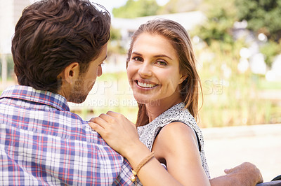 Buy stock photo Couple, portrait and bonding on love bench in nature park or city garden on valentines day, romance date or marriage anniversary. Smile, happy woman or man on outdoor seat hug or relax wood furniture
