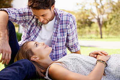 Buy stock photo Happy couple, lying and love on grass field, nature park or garden on valentines day, romance date or marriage bonding. Smile, woman and man in relax environment, summer break or partnership picnic
