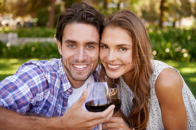 Buy stock photo Love couple, portrait or wine toast for picnic, valentines day or romance date bonding in nature park or garden. Smile, happy woman or man and alcohol drinks glass in marriage anniversary celebration