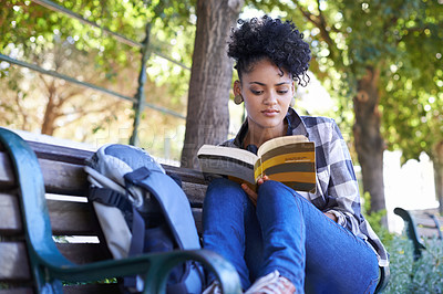 Buy stock photo Woman, student and book on bench for studying university, education or reading. Female person, academic and park on college campus or school diploma for knowledge, learning or research literature